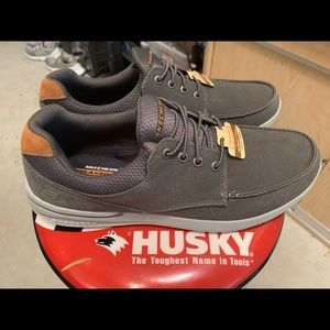 Never worn Sketcher slip ons. Size 15.